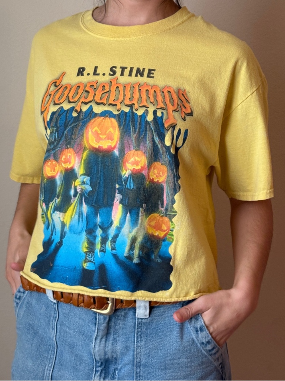 Scholastic Goosebumps Yellow Pumpkin-Head Graphic Cropped Tee